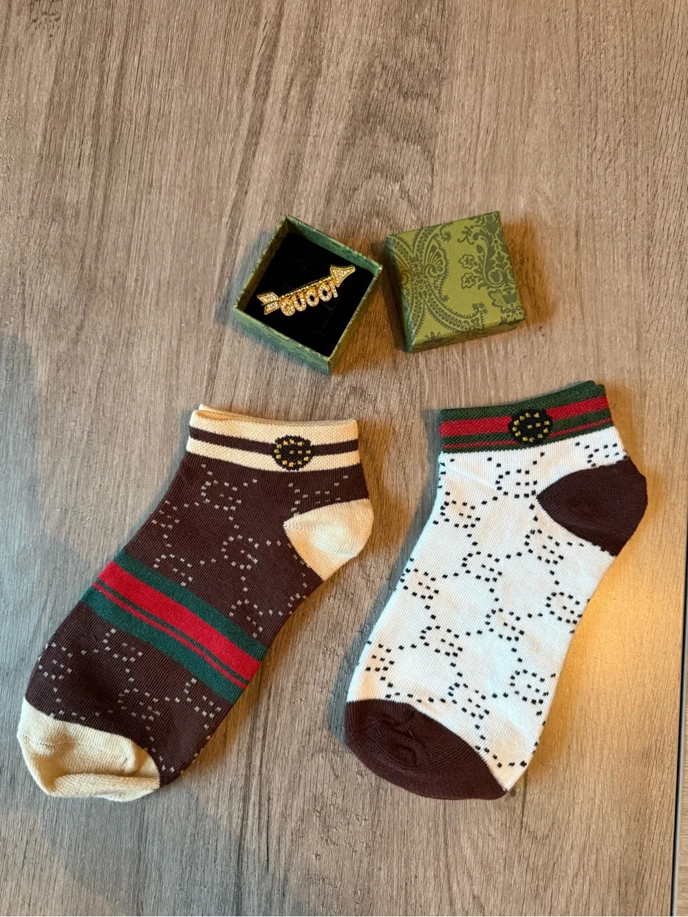 Gold Brooch and GG Designed Socks